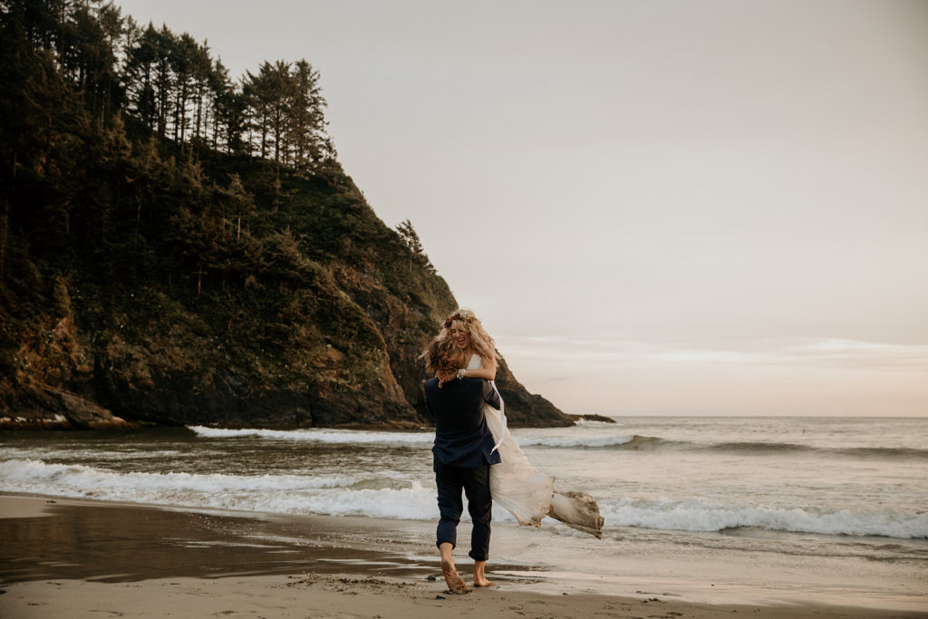 Bride and groom at their beach elopement on the Oregon coast