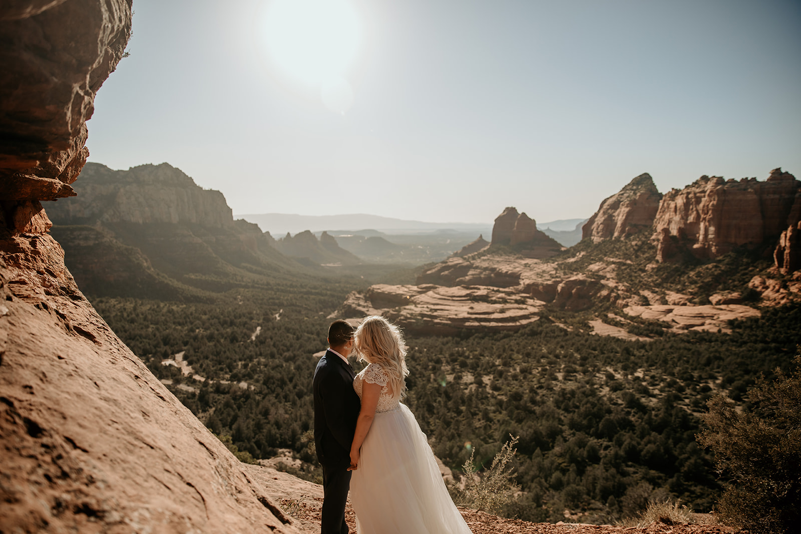 Bride and groom at their sunny elopement in Sedona, Arizona.