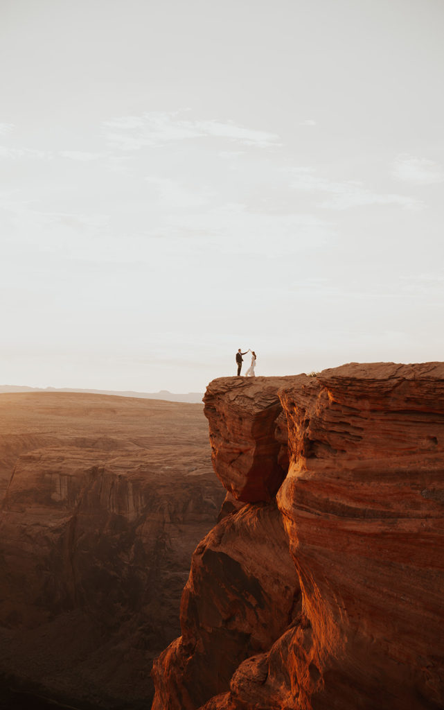 Bride and groom at their elopement at Horseshoe Bend in Page, Arizona