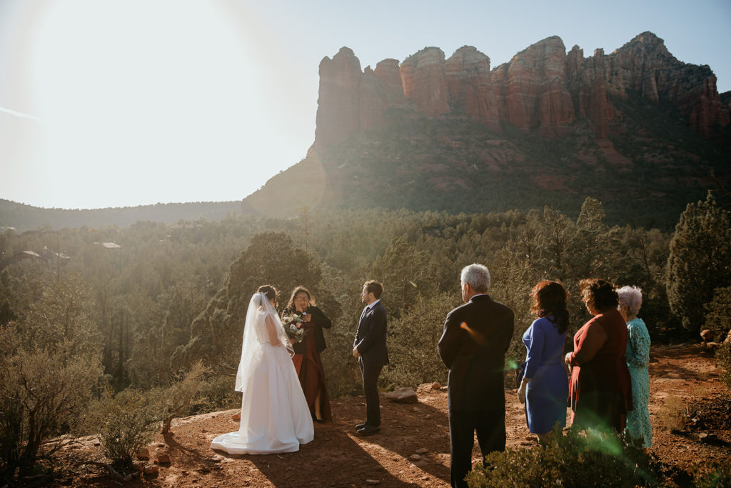 Bride and groom with their family at the sedona elopement