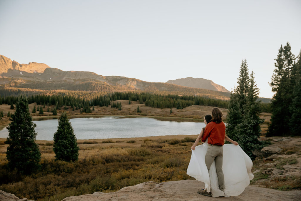 Bride and groom at their elopement by a lake in Colorado
