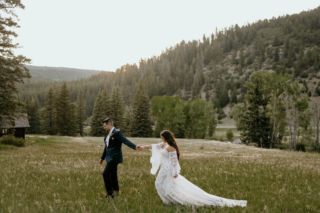 bride and groom hiking at their elopement in New Mexico