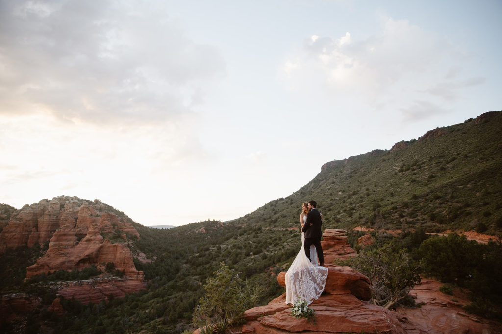 Bride and groom at their off roading elopement in the red rocks of Sedona, Arizona