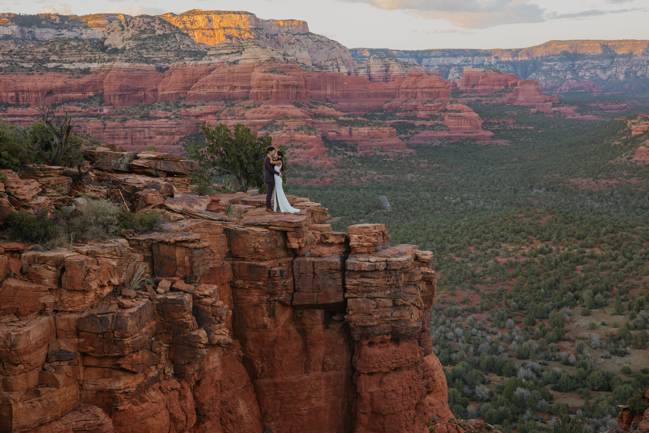bride and groom kissing at sunset elopement in sedona arizona